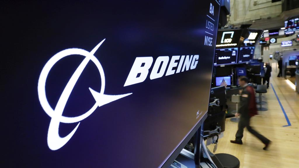 Firm hit: Boeing shares were down nine per cent at the Frankfurt and New York stock exchanges following the crash PICTURE: AP