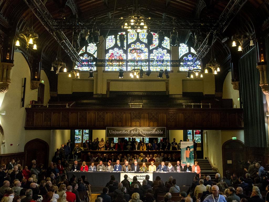 Reaction: Families of those who were killed hold a press conference inside the Guildhall in Londonderry