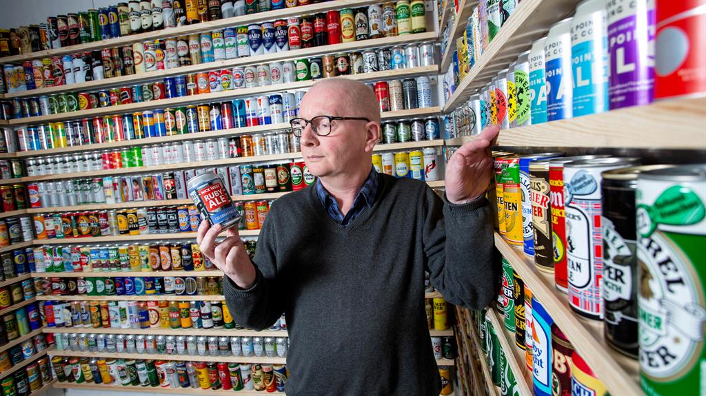 Froth's not to like? Nick with his beloved cans PICTURES: SWNS