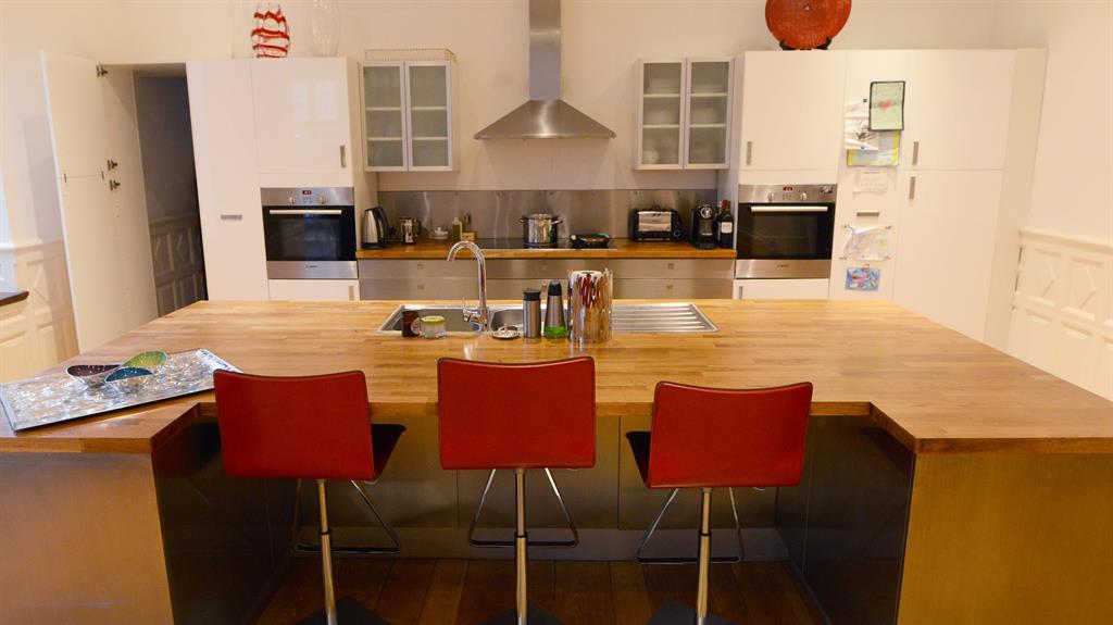 Past and present: Stacey’s kitchen is where her music video, pictured above, was filmed