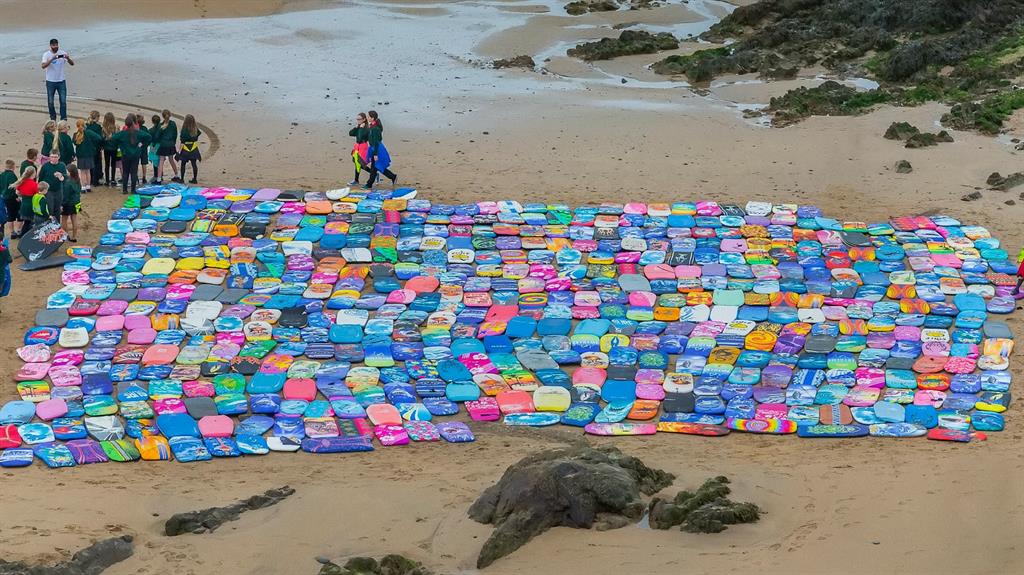Board stupid: Hundreds of broken bodyboards laid out in Bude, Cornwall PICTURE: SWNS