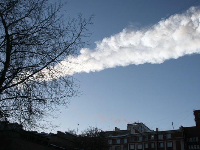 Up above: The vapour trail of a falling meteorite as seen in the sky over the city of Chelyabinsk, Russia, on February 15, 2013 PICTURE: EPA IMAGES