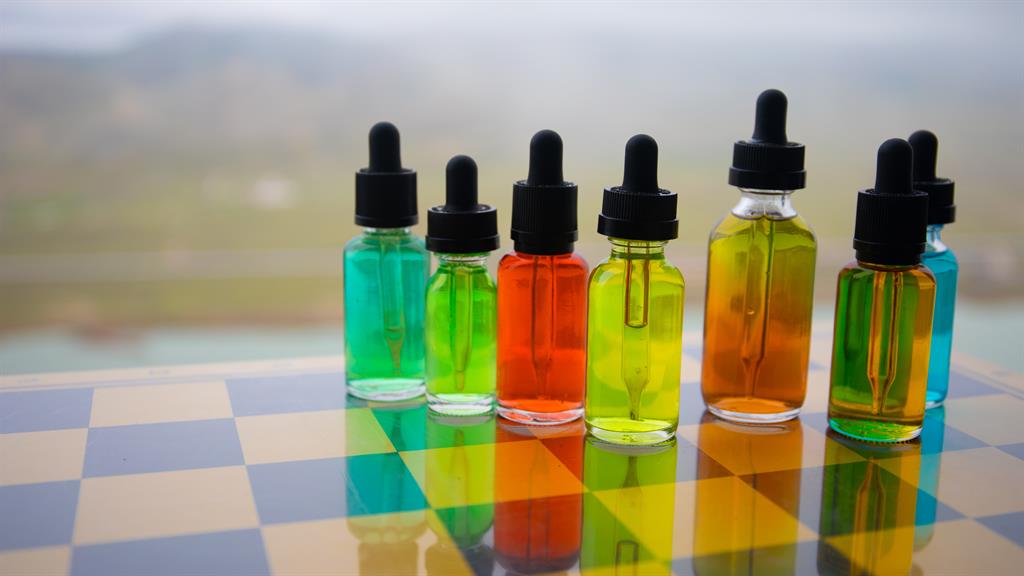 Colourful: Vape bottles and (below) Dr Christian Jessen