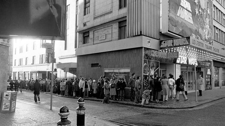 Out of this world: Cinema-goers queue outside the Leicester Square Theatre for the London opening of the movie Star Wars in 1977 PICTURE: PA