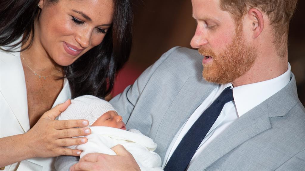 Proud parents: The Duke and Duchess of Sussex with their son, Archie Harrison Mountbatten-Windsor PICTURE: PA