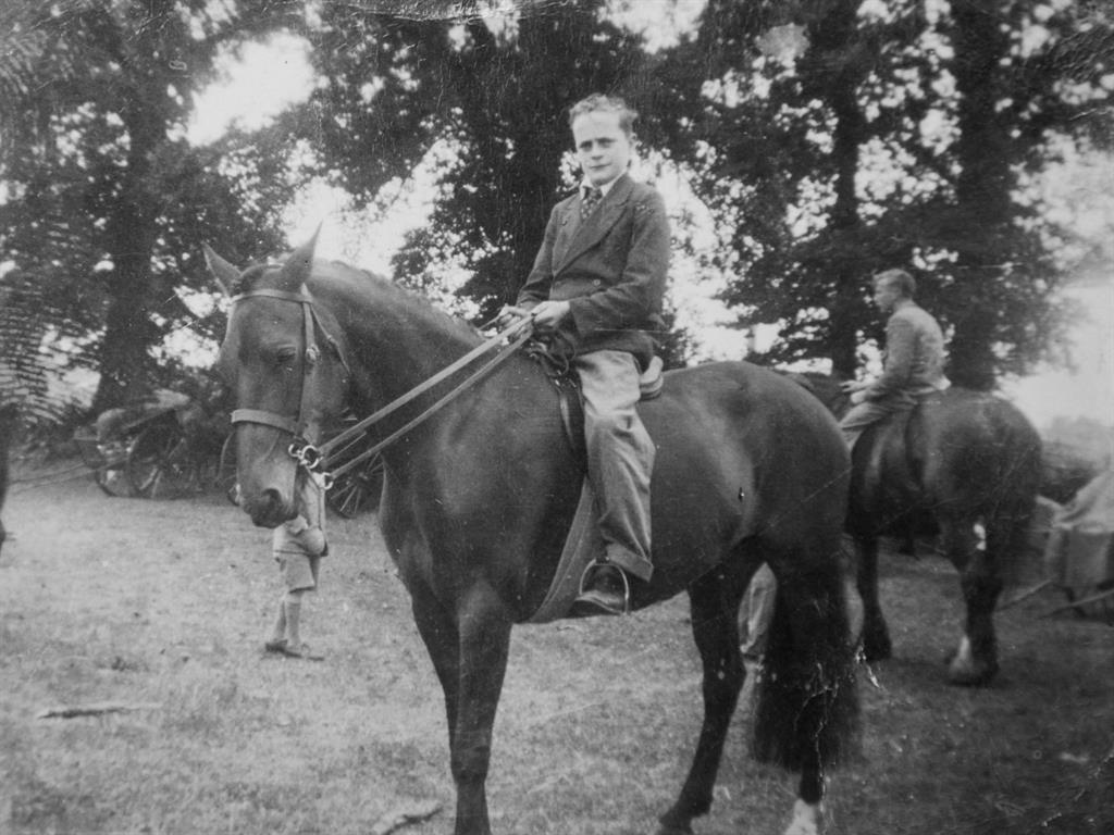 In the saddle: Glyn aged 13, the age he was approached by 'the captain' to become a spy