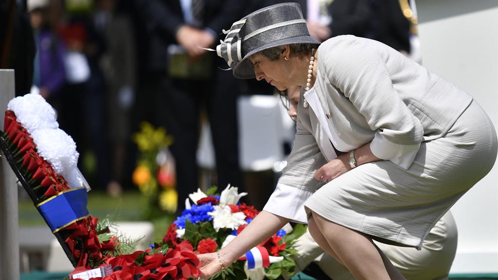 Remembering those we lost: Prime minister Theresa May lays a wreath during the Royal British Legion's Service of Remembrance PICTURE: PA