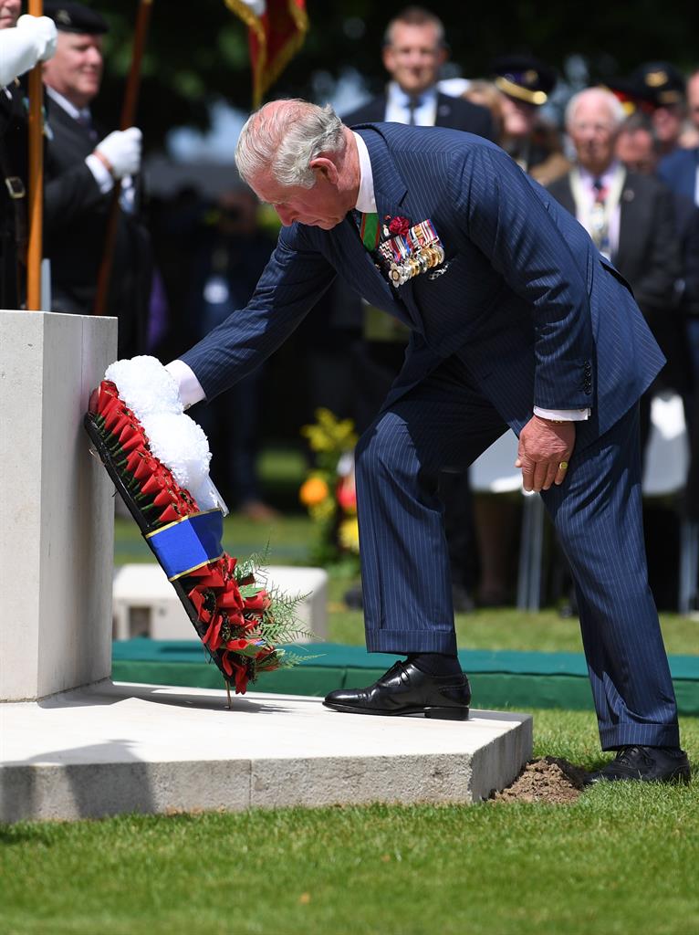 Thankful: The Prince of Wales lays a wreath during the Royal British Legion Service of Remembrance at the Commonwealth War Graves Cemetery PICTURE: GETTY