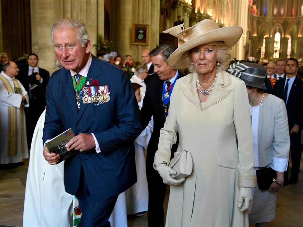 Ceremony: Charles and Camilla leave Bayeux Cathedral PICTURE: GETTY