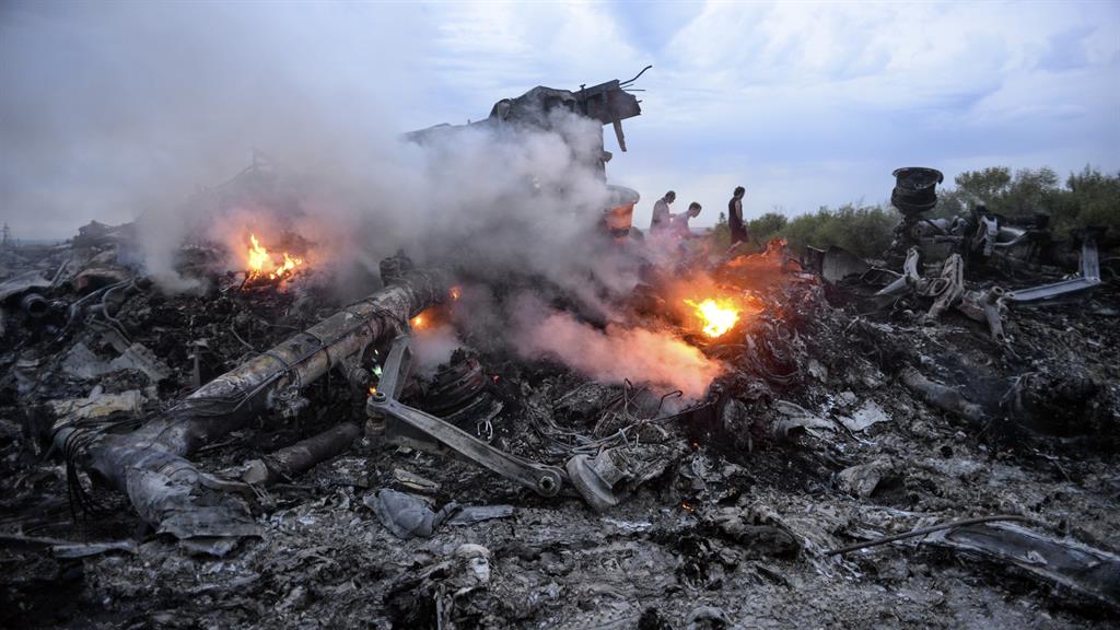 Devastation: Debris of flight MH17 which was shot down over Ukraine in July 2014, killing 298 people PICTURES: EPA