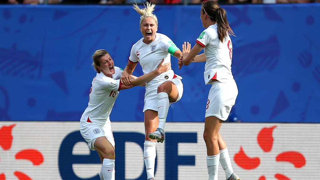 Highs and lows: Houghton (centre) celebrates putting England ahead but was left in agony (main picture) following an awful late challenge in a match in which Cameroon’s players (below) raged at VAR decisions PICTURES: GETTY