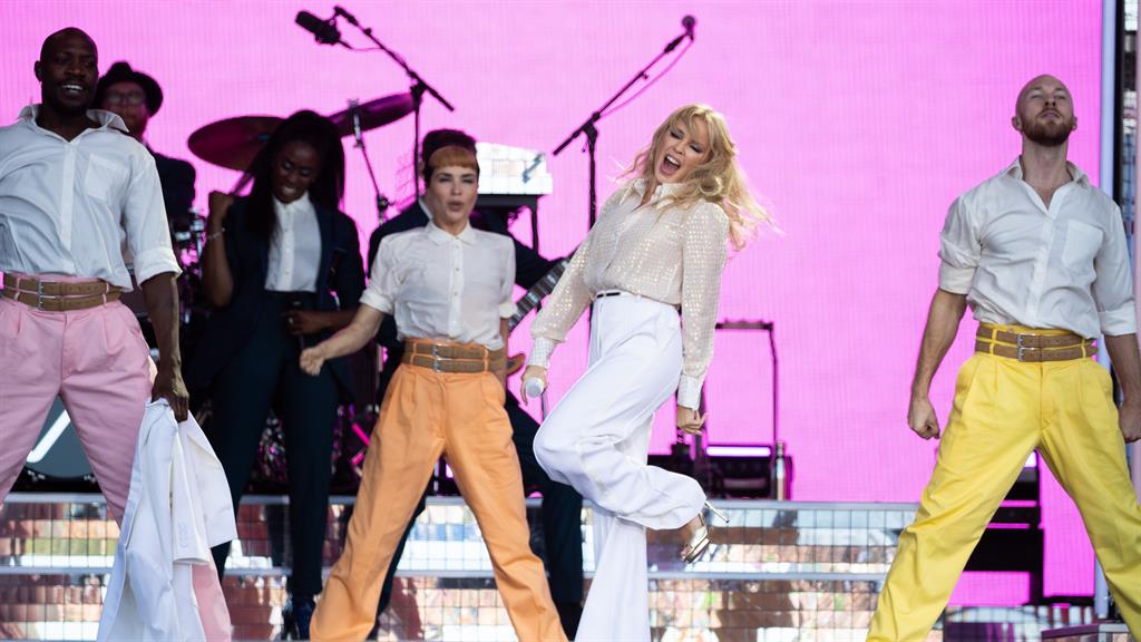 Kicking back: The songstress made the most of her moment as she performed to the crowd PICTURE: SWNS