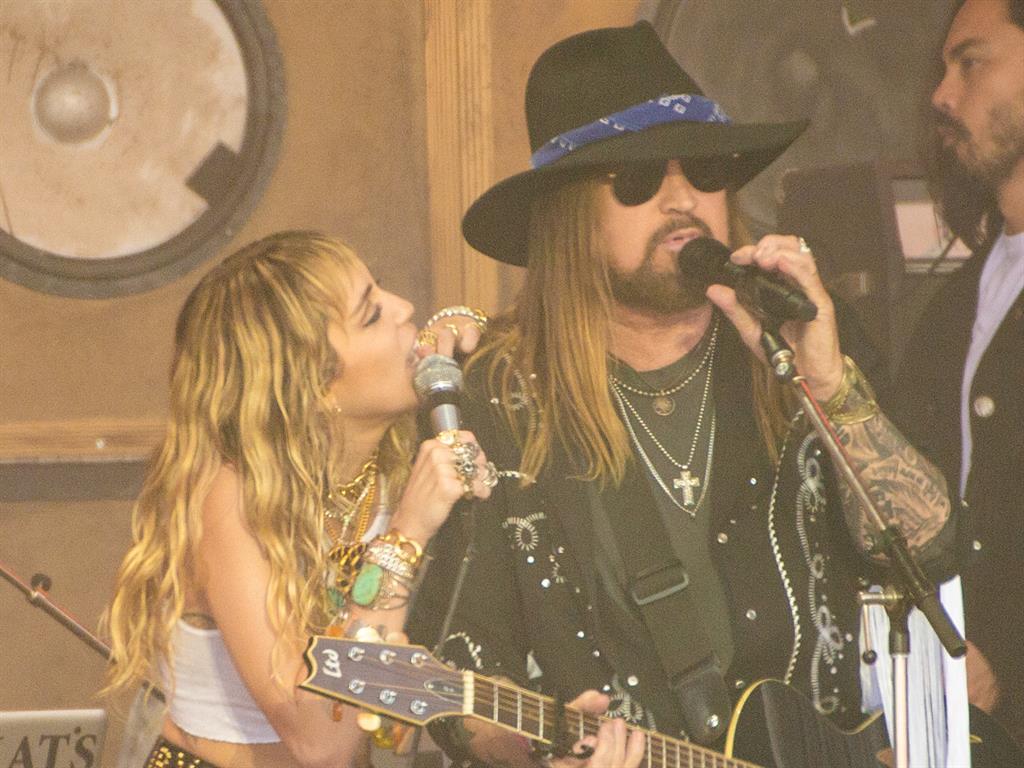 Special guests: Singer Miley brought out a whole host of guest performers to join her on stage, including her dad, Billy Ray Cyrus PICTURE: GETTY