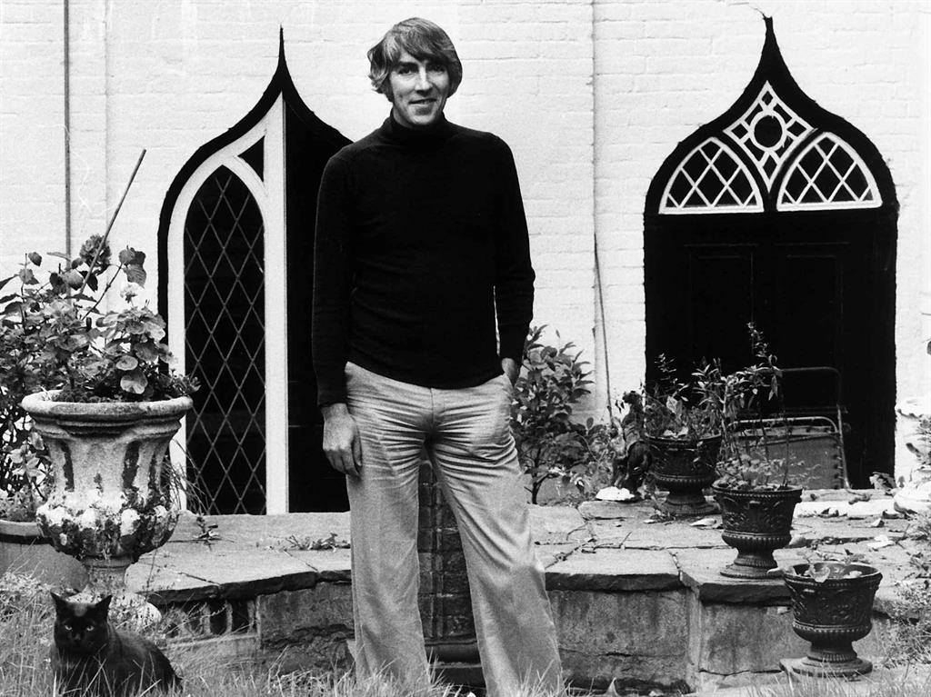 Safe space: Peter in his beloved garden in 1975 PICTURE: ALAMY