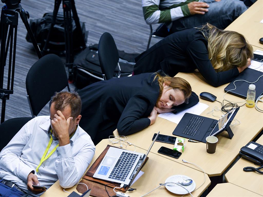 Here is the snooze: A journalist texts as others grab 40 winks