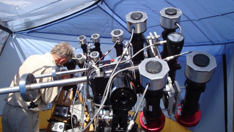Plenty of kit: Some of the scientific instruments built and prepared by an international team of scientists led by Prof Shadia Habbal (University of Hawaii) to observe eclipses. The team’s chief engineer, Judd Johnson, is busy fine-tuning one of the telescopes PICTURE; SHADIA HABBAL