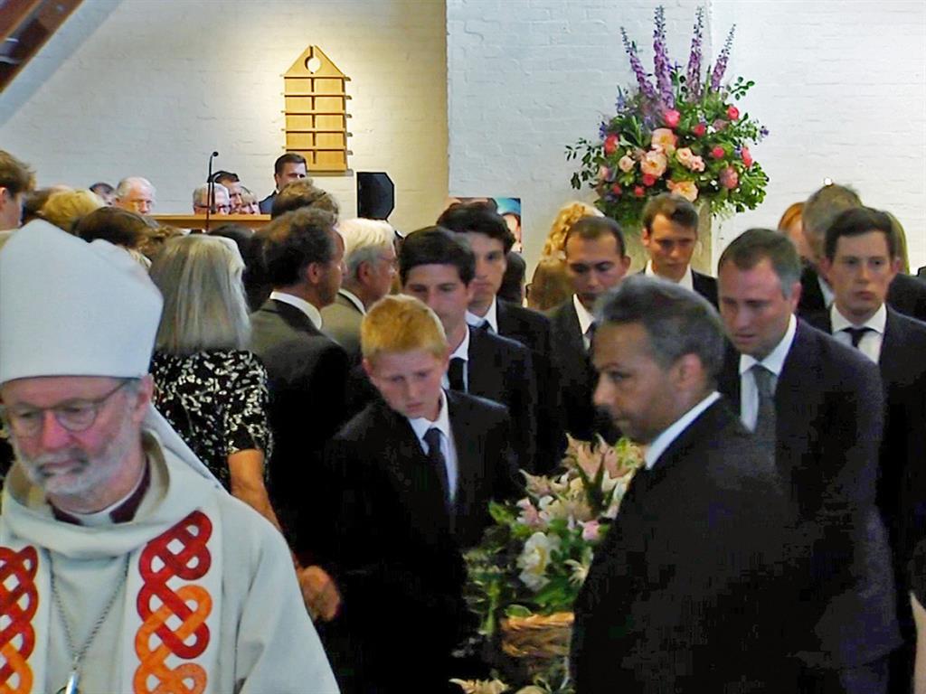 Final farewell: The funeral at St Mary's Church in Barnes, London