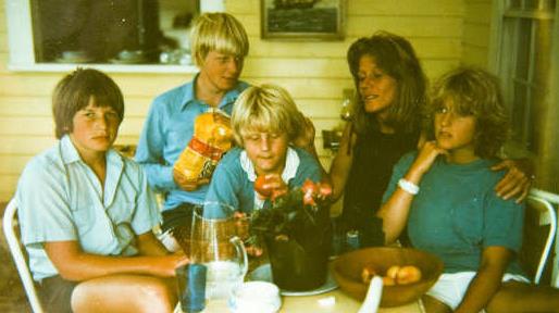 Childhood snap: A young Boris (centre back) with his family, including his sister Rachel (right)