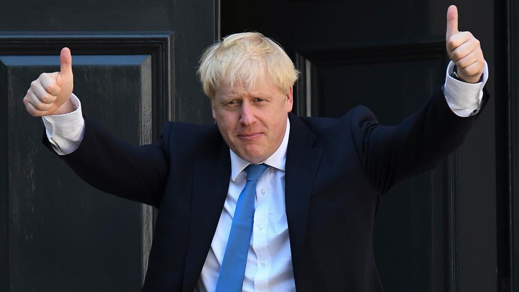 Dislocated: But BoJo's thumbs are fine now PICTURES: REX