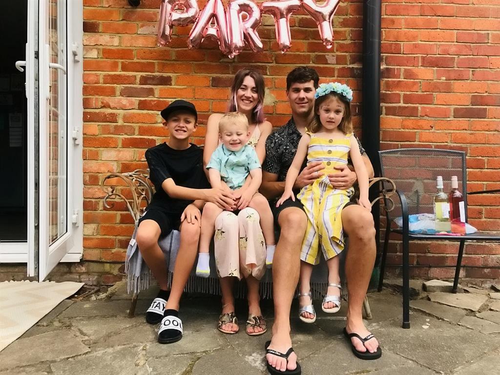 Thankful: (Left to right) Charlie Waters,10, Katie Jones with Orson, three, and Ryan Jones with Hattie, five
