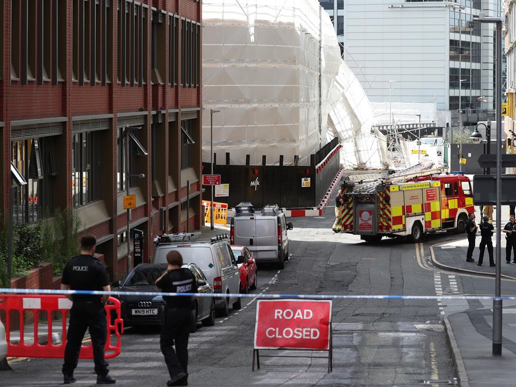Response: Emergency services at the scene of the scaffold collapse