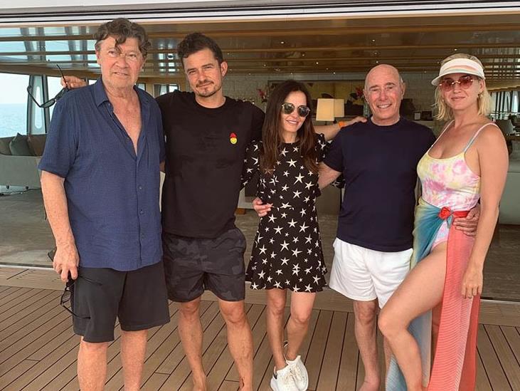 Top deck: (From left) Robbie Robertson, Orlando Bloom, Janet Zuccarini, David Geffen, Katy Perry