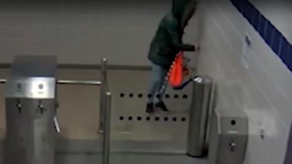 Caught: CCTV captured heroin and cocaine addict Peat in the train station toilets shortly before she set light to one of the sanitary bins PICTURES: PA