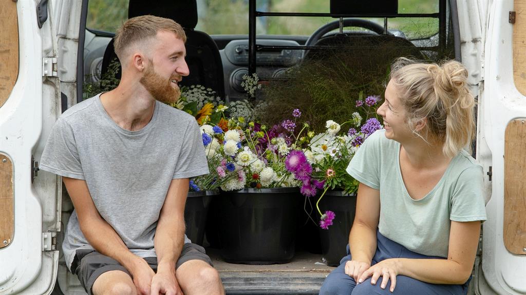 All worth it: The green-fingered couple take time out between picking flowers