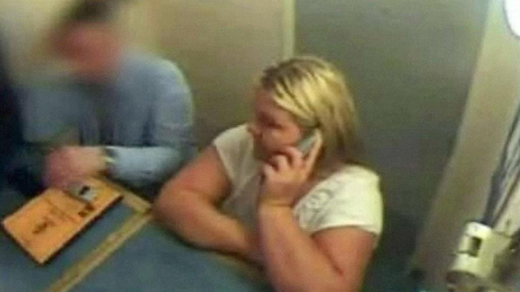 On phone with lawyer: Vanessa George in police custody in Plymouth PICTURE: DEVON AND CORNWALL POLICE
