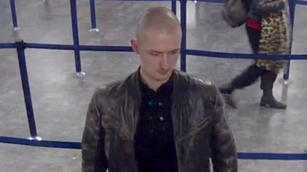 Fleeing: Belorusov at Luton airport where he took a flight to his home country Estonia PICTURE: MET POLICE/PA