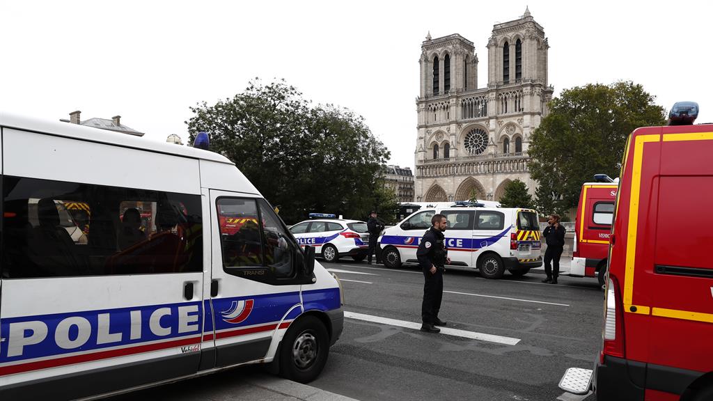 Scene: The attack happened at the police headquarters across from Notre Dame cathedral