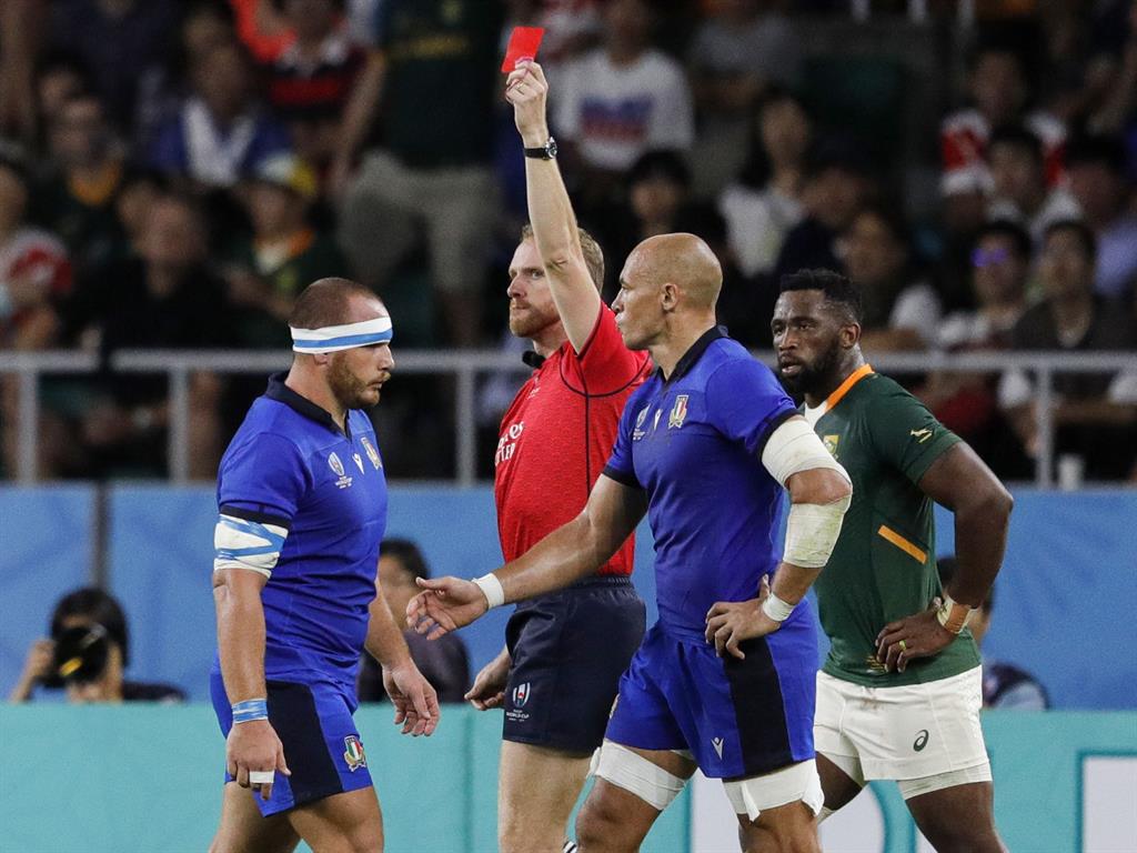 Red-carded: Andrea Lovotti is sent off after his dangerous challenge PICTURE: GETTY