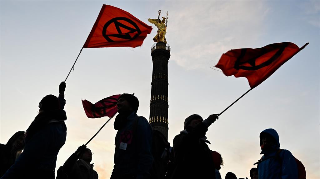 Civil disobedience: Protesters block the roads around the Victory Column (Siegessaeule) to mark the beginning of Extinction Rebellion action in Berlin PICTURE: GETTY