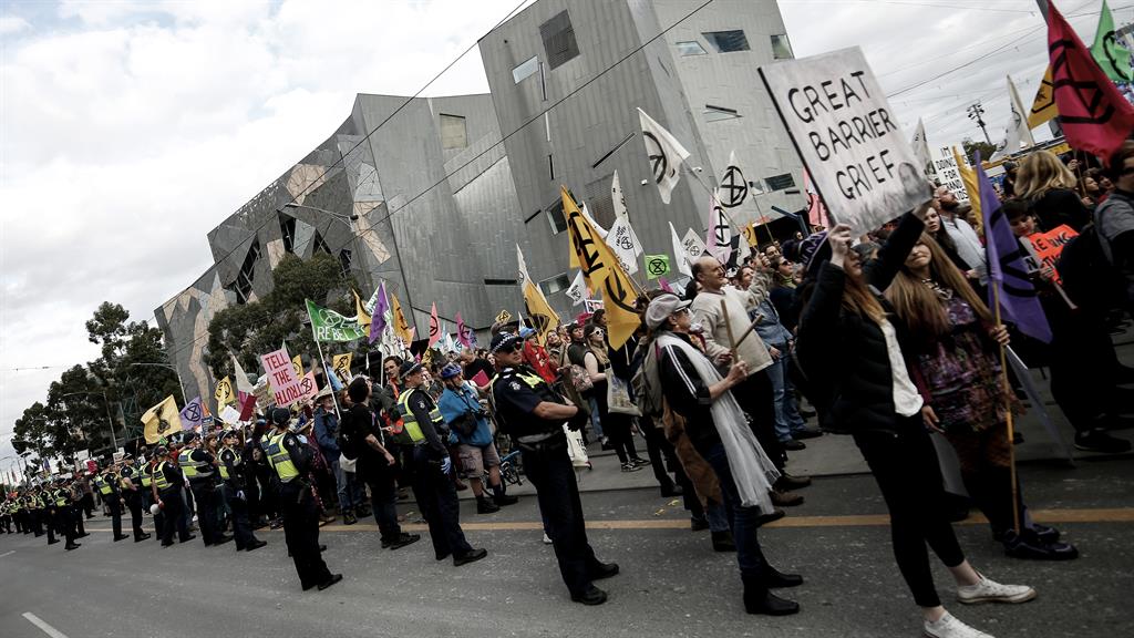 Week of action: Police look on as protesters gather in Melbourne, Victoria, Australia PICTURE: GETTY