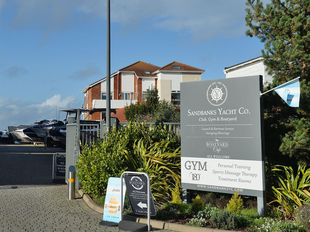 Prosec-no: George was refused drink at yacht club (above) in exclusive Sandbanks (below) PICTURES: BNPS