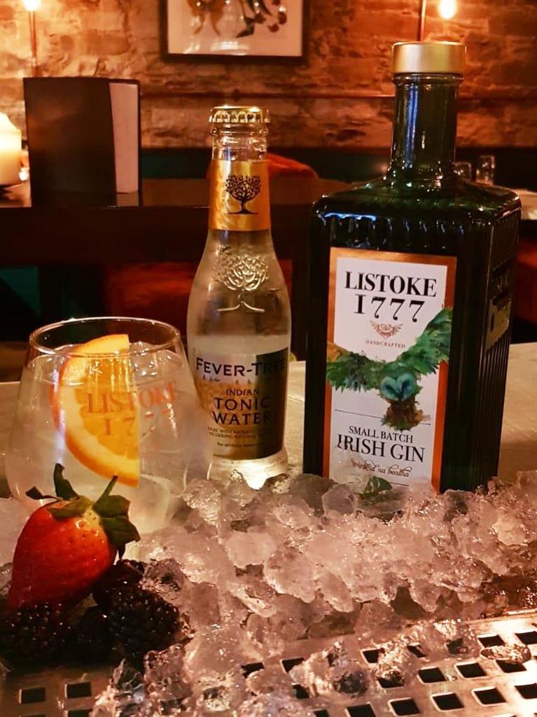 Gin blossoms: Above, take a two-hour workshop at the Listoke Gin Distillery near Drogheda; below, Jerry Fish’s Electric Púca Sideshow will perform at the Púca festival