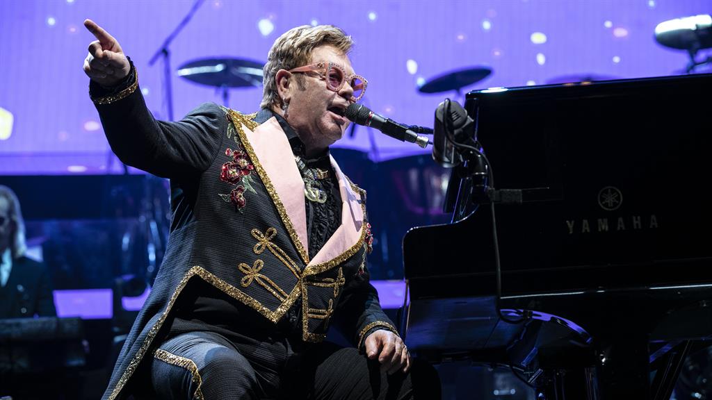Still Standing by his words: Elton claims George was 'uncomfortable in his skin about being gay' PICTURES: PA/GETTY