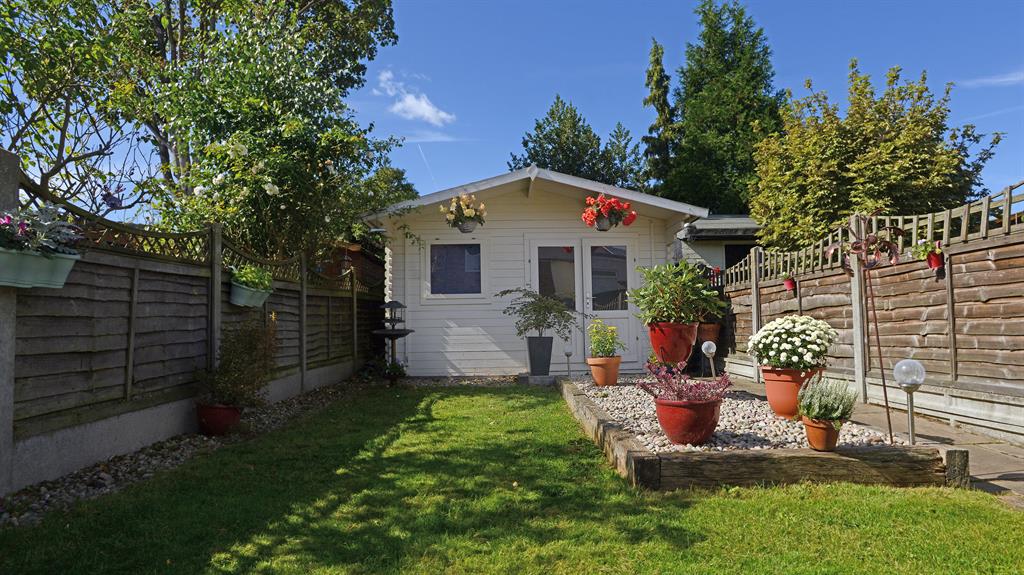 Green fingers: Jamie has transformed the outdoor space and created a bee garden, below