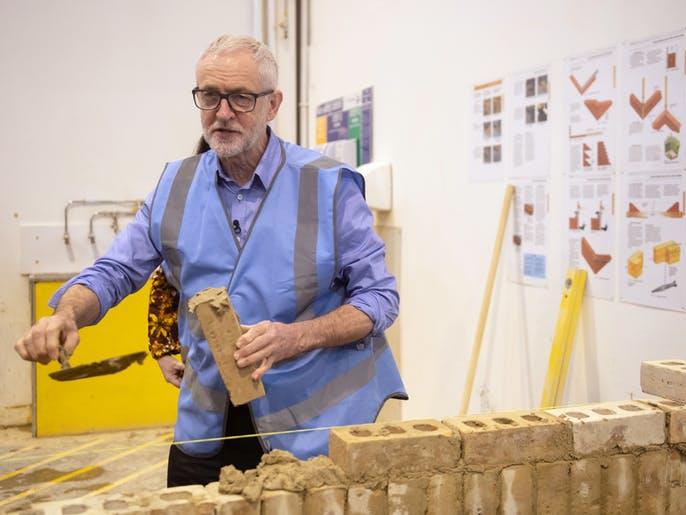 Corbyn the builder: Election campaigns are an opportunity for party leaders to learn new skills, like bricklaying PICTURE: PA