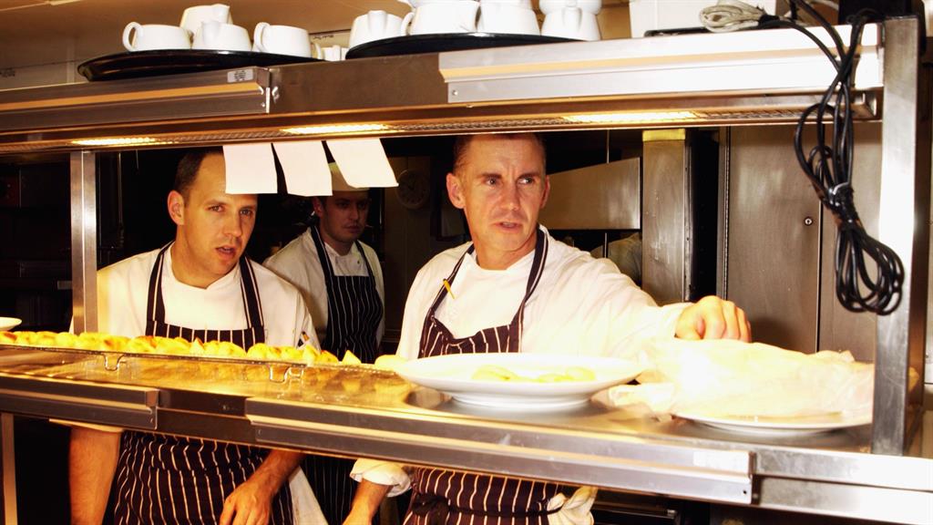 Focus: Rhodes hard at work in one of his restaurants in 2003 PICTURE: GETTY