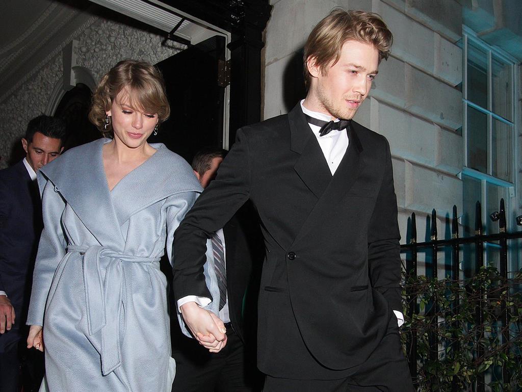 Fame: Joe with girlfriend Taylor Swift at the Vogue Bafta party this year PICTURE: REX