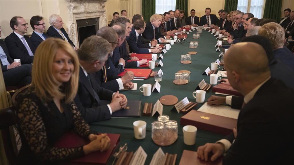 Top table: Housing minister Esther McVey smiles at camera as PM gives pep talk PICTURE: AP Top table: Housing minister Esther McVey smiles at camera as PM gives pep talk PICTURE: AP