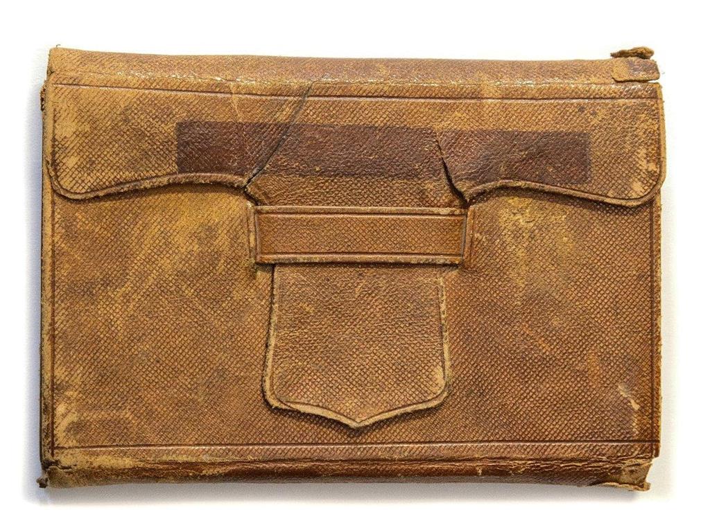 Disguised: The saucy book resembles a wallet PICTURES: SWNS