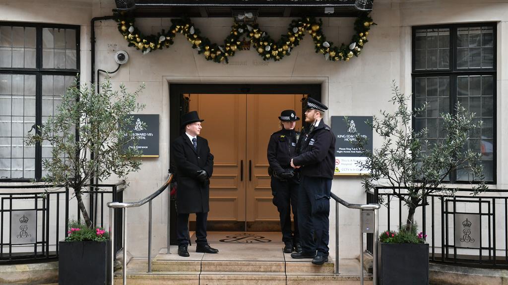 On guard: Police officers outside King Edward VII's Hospital in London where Prince Philip was admitted for observation and treatment PICTURE: PA
