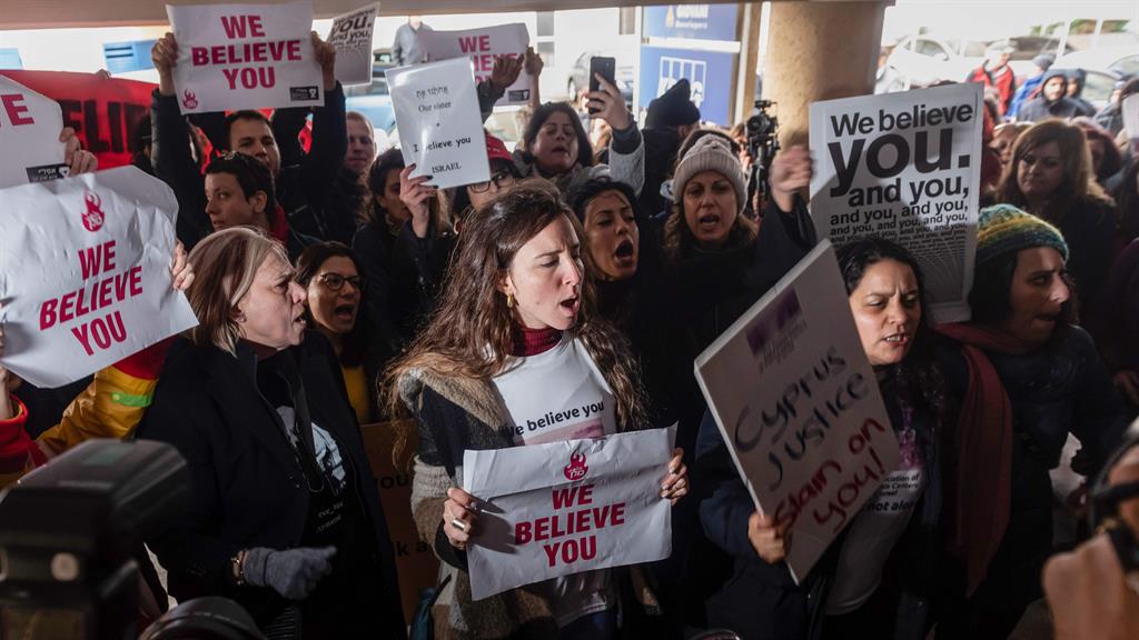 On side: Activists protest outside the court in support of the teenager PICTURE: GETTY