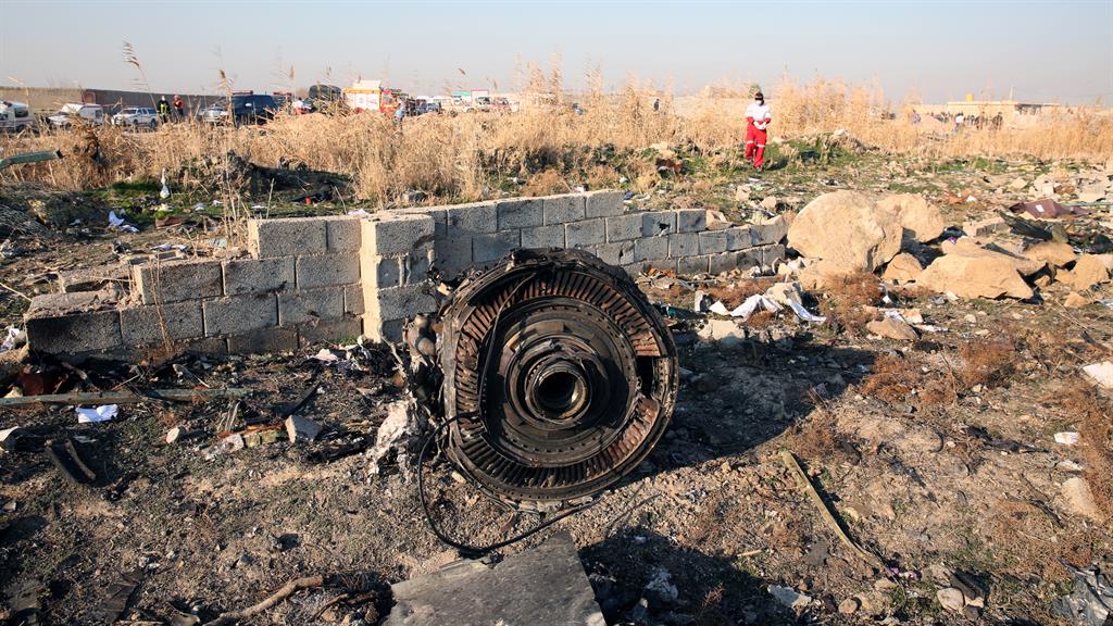 Debris: An engine from the jet lies on the ground PICTURE: GETTY