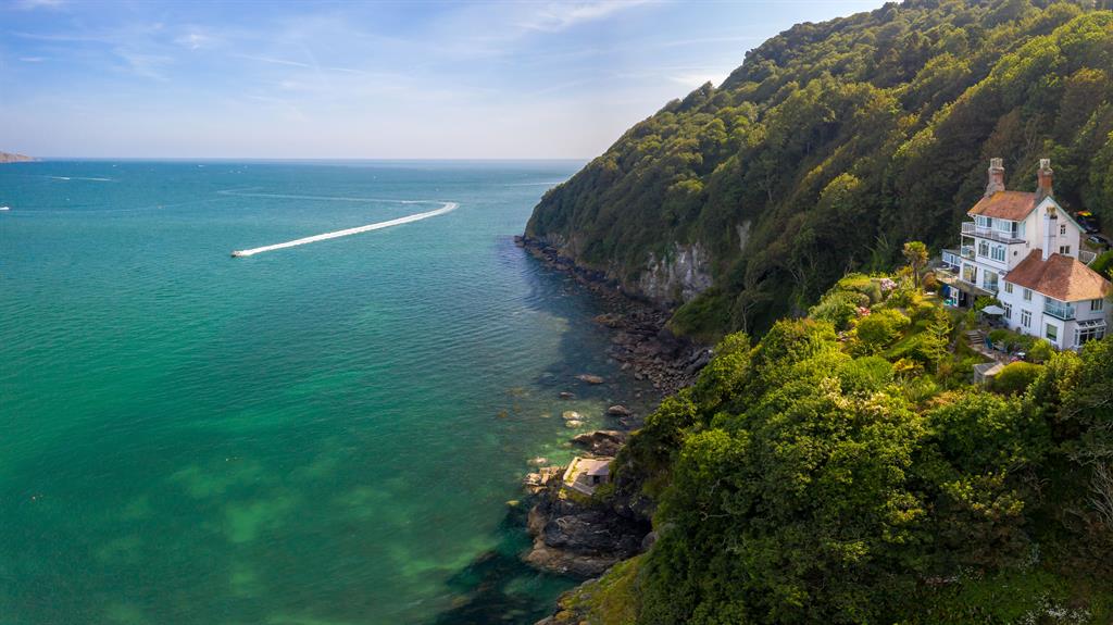 On the edge: Owners say living in the Devon home is like being on holiday PICTURE: BNPS