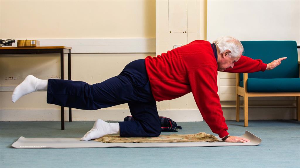 Super fit: Tom says he plans to continue yoga until he is 100 and beyond