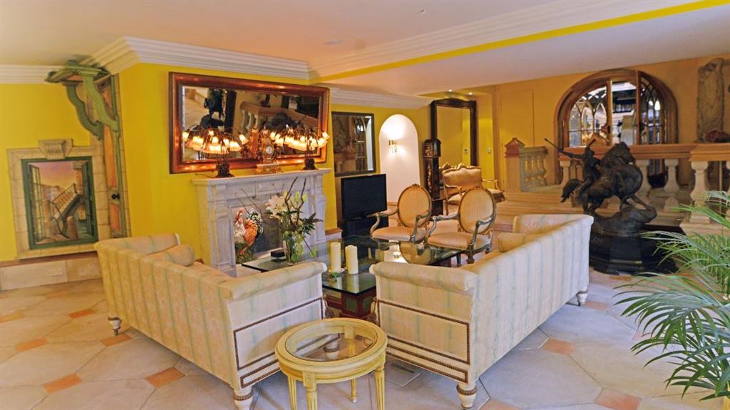 Lemon zinger: The vibrant Venice Room. Inset above: The ‘his and hers’ thrones in the living room