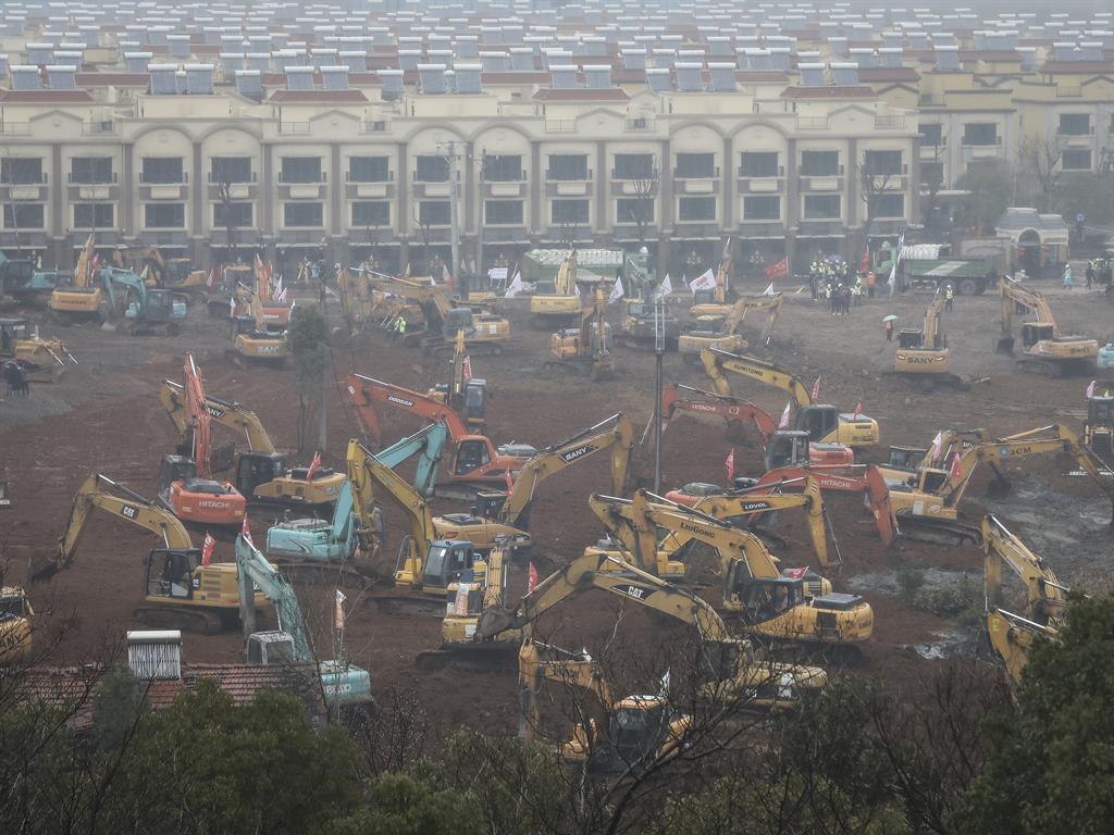 Construction work: Officials are looking to complete a new 1,000-bed hospital in Wuhan in the next 10 days PICTURE: GETTY